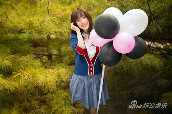 張儷清新寫(xiě)真如鄰家少女